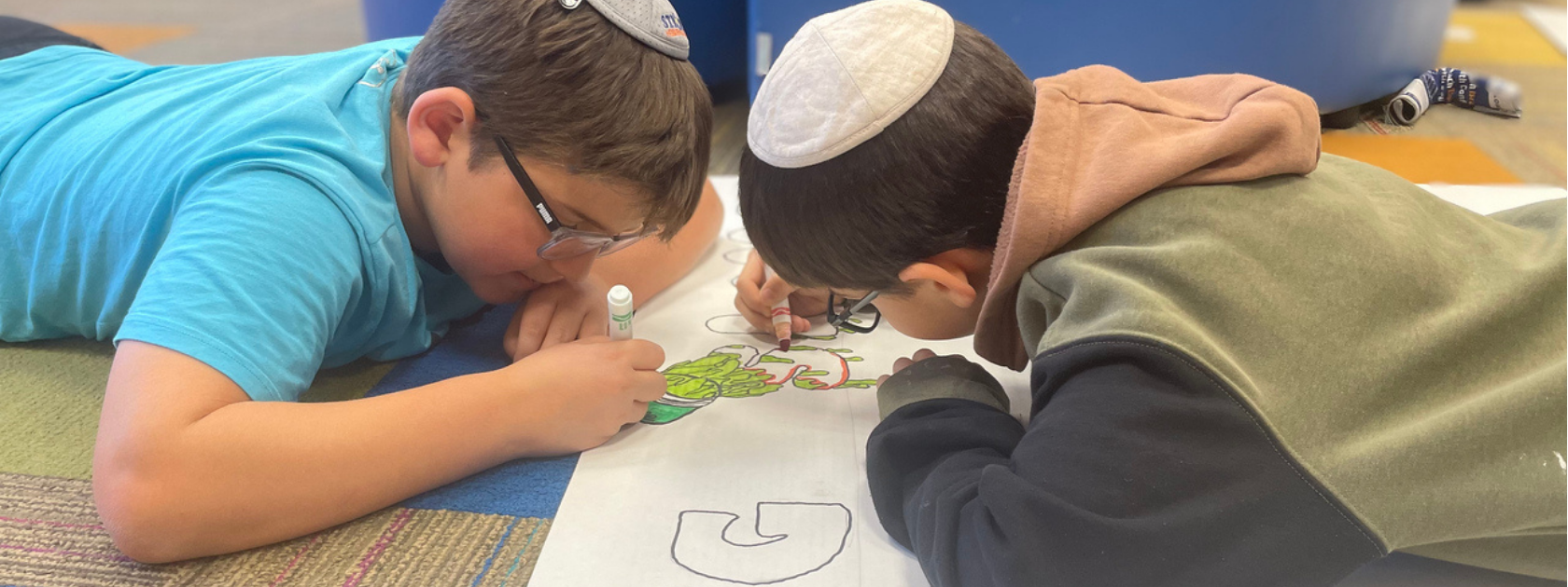 students working on a science fair project together